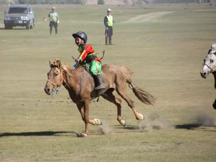 Take your backpack - 5 year old youngsters competing for the prestigious Naadam horse race trophy - 0